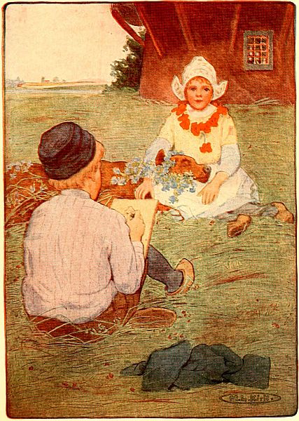 Two children on the ground, one drawing the other