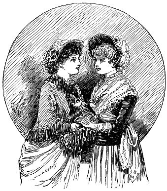 two young women holding hands and talking