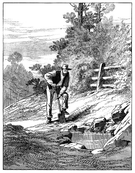 man digging by well