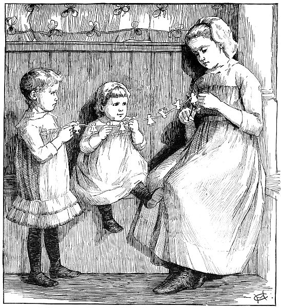 Three children with paper doll chain