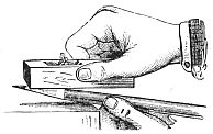 hands using pencil sharpener