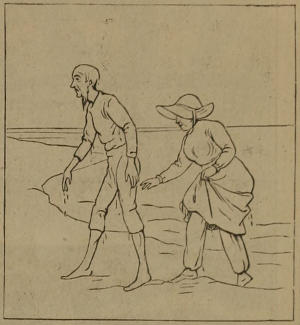 Two people coming out of the sea. They’ve been paddling.