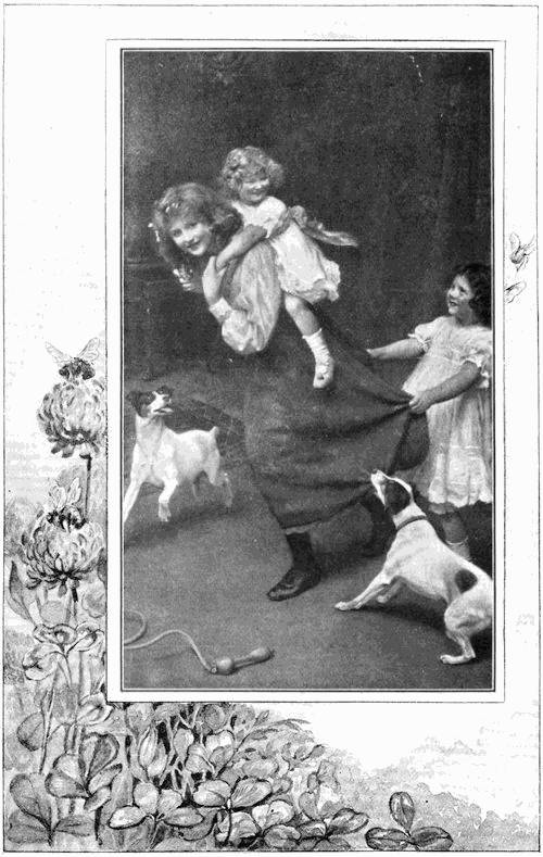 Woman with two children and dogs